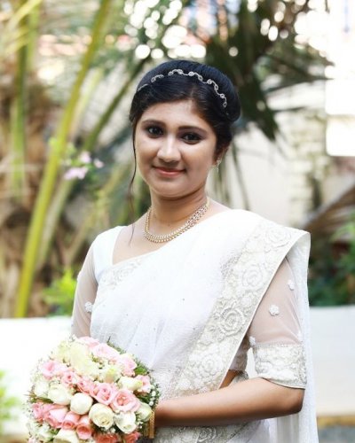 Adorable bride in white saree - feathertouch beauty salon, pathanamthitta